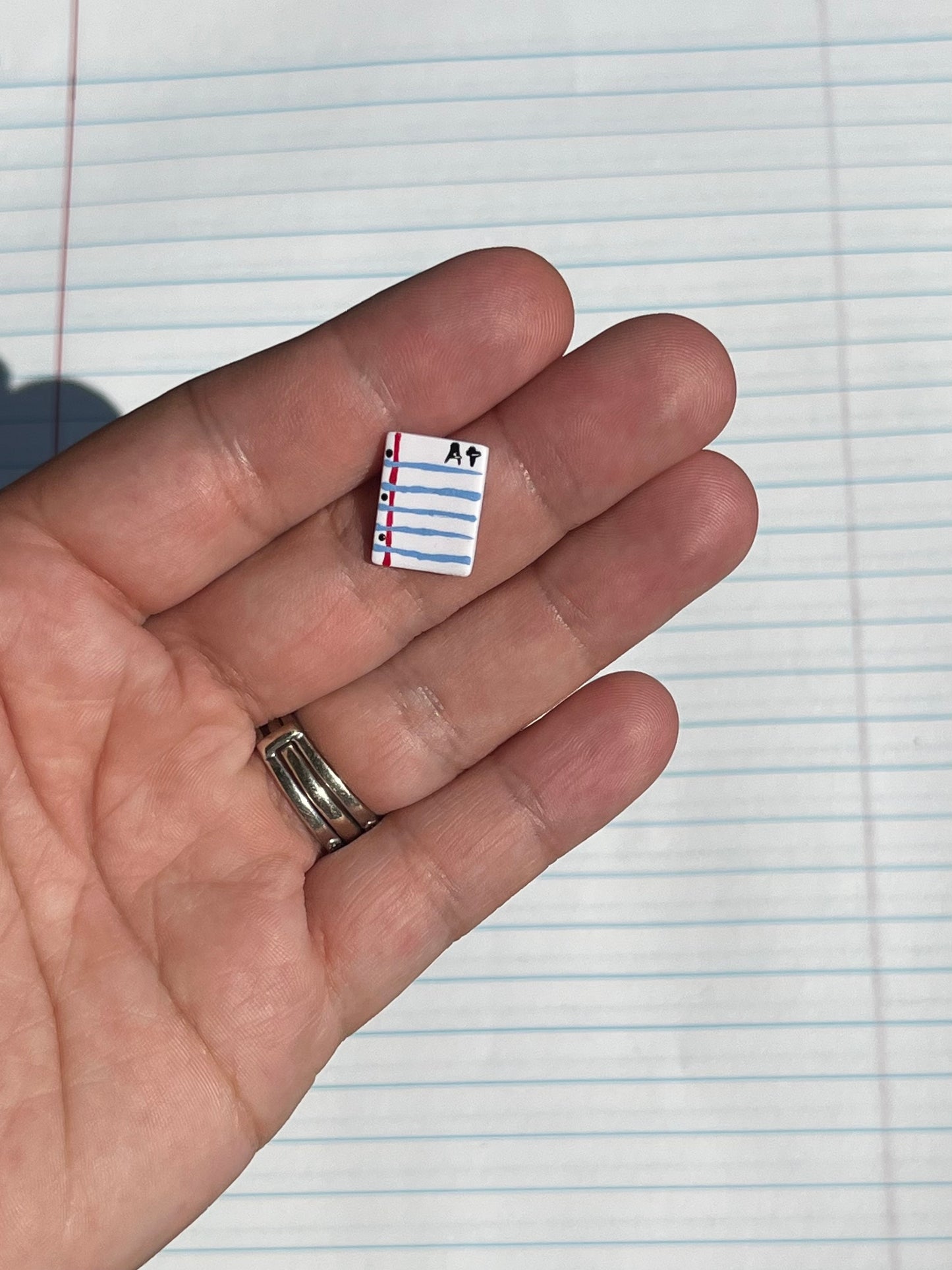 Lined paper stud